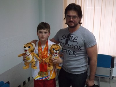Олимпионик Плотников Алексей с отцом.jpg